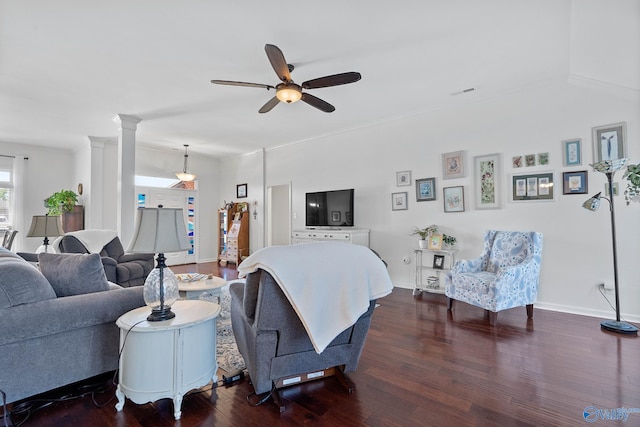 living area with wood finished floors, ceiling fan, baseboards, and visible vents