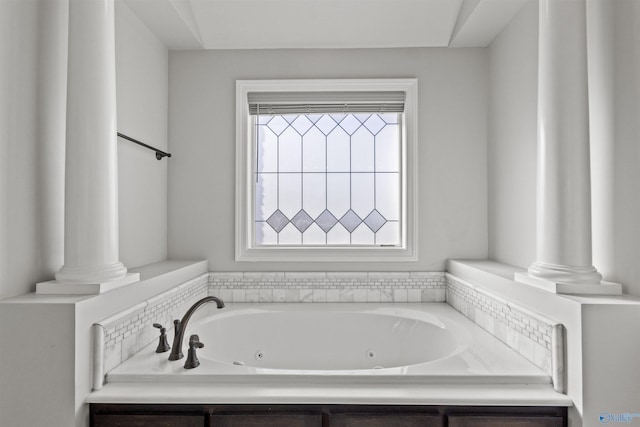 bathroom featuring a washtub