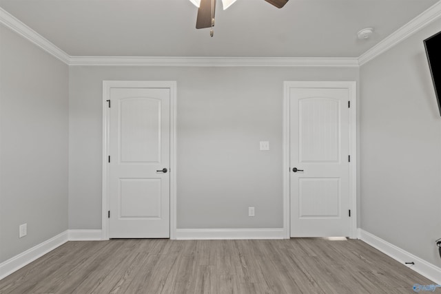 unfurnished room with crown molding, ceiling fan, and light wood-type flooring