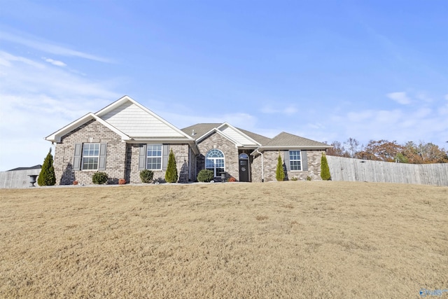 view of front of house with a front lawn