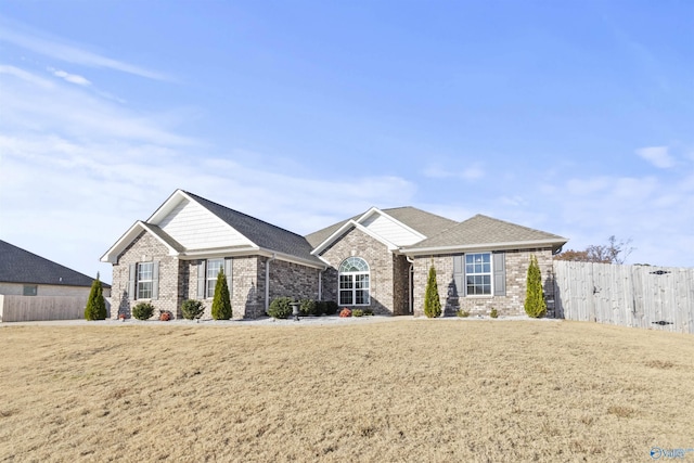 ranch-style house with a front yard