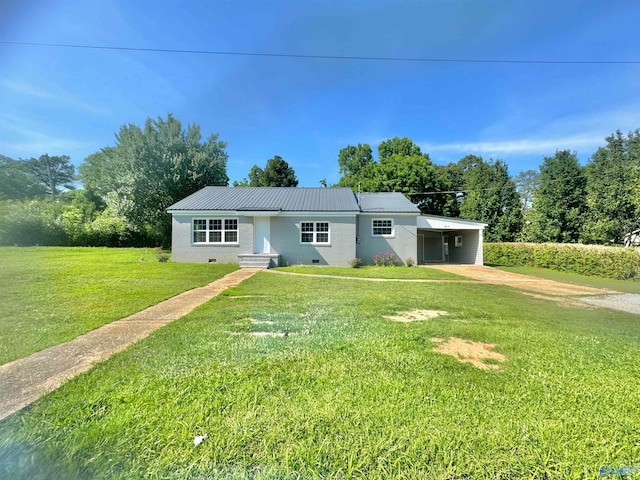 ranch-style home with a carport and a front yard