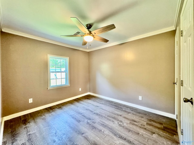 interior space featuring ceiling fan, hardwood / wood-style flooring, and ornamental molding