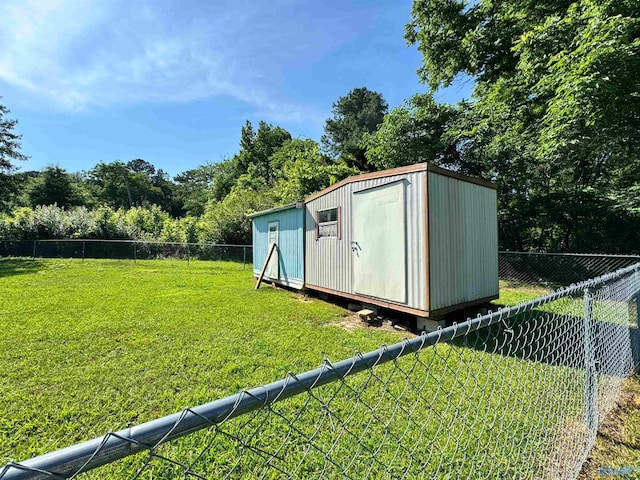 view of outdoor structure with a yard