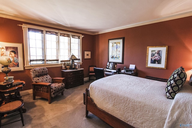 bedroom with baseboards, crown molding, and carpet