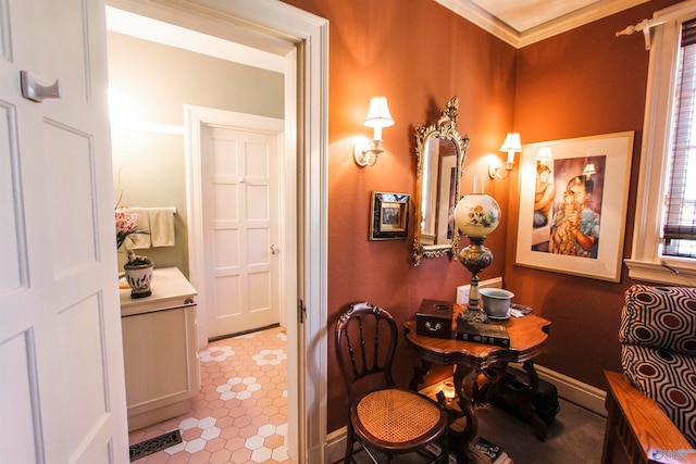 interior space featuring ornamental molding and light tile patterned floors