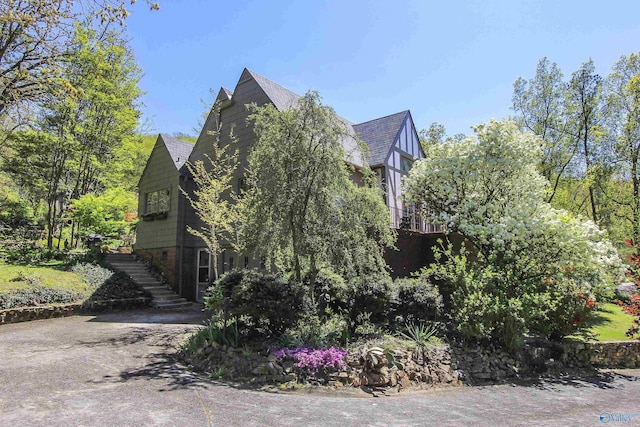 view of front of house with stairway