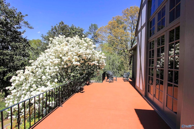 view of patio / terrace with a balcony