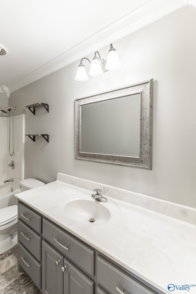 full bathroom featuring shower / bath combination, toilet, vanity, and crown molding