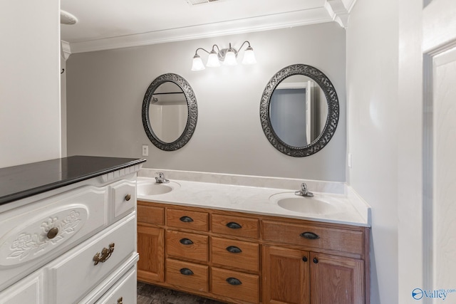 bathroom featuring vanity and crown molding