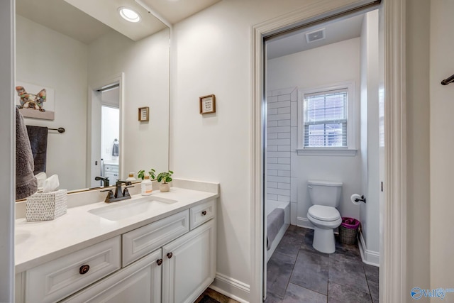 full bath featuring visible vents, baseboards, toilet, and vanity