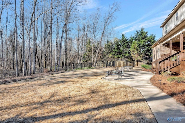 view of yard with a patio and fence