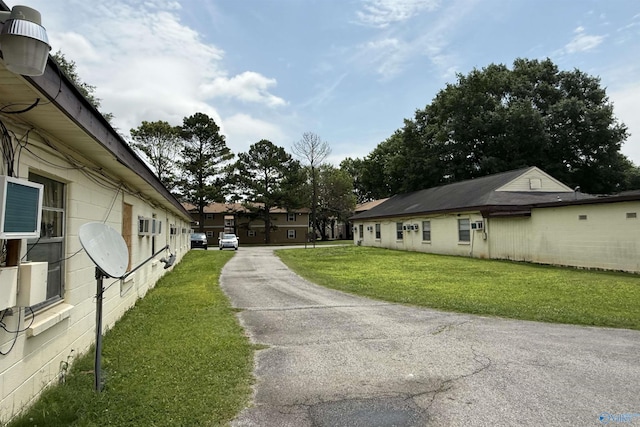 3004 SW Clopton St Unit 28, Huntsville, AL 35805 - view of side of home with a yard