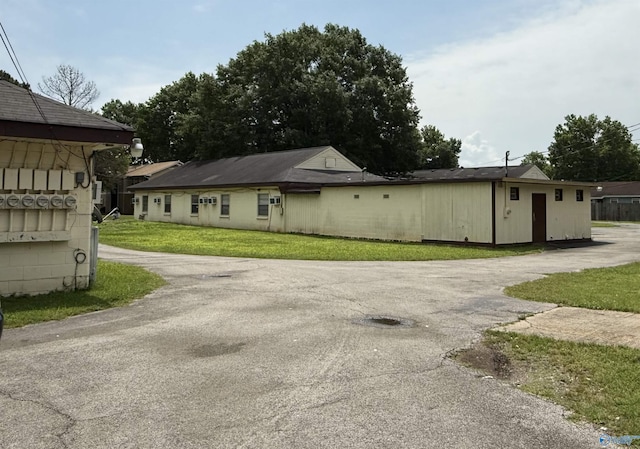 3004 SW Clopton St Unit 28, Huntsville, AL 35805 - view of home's exterior featuring a yard and driveway