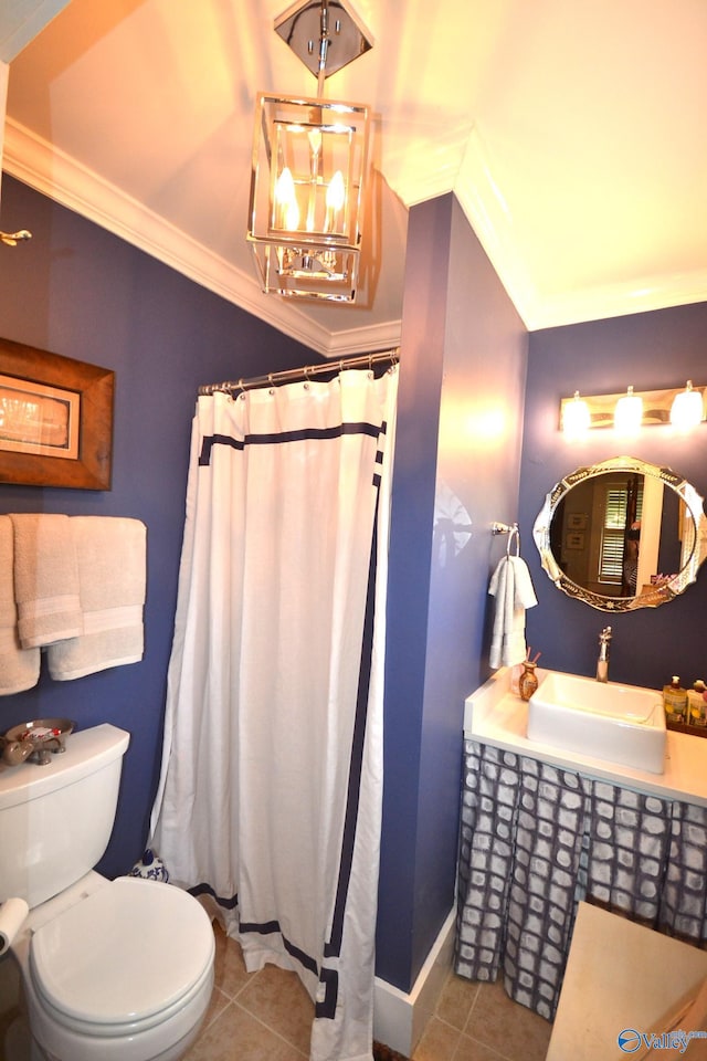 bathroom with tile patterned floors, toilet, sink, an inviting chandelier, and crown molding