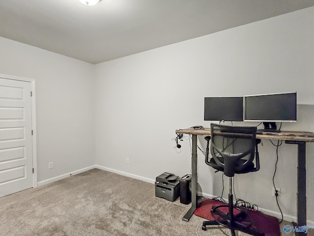 home office featuring carpet flooring and baseboards