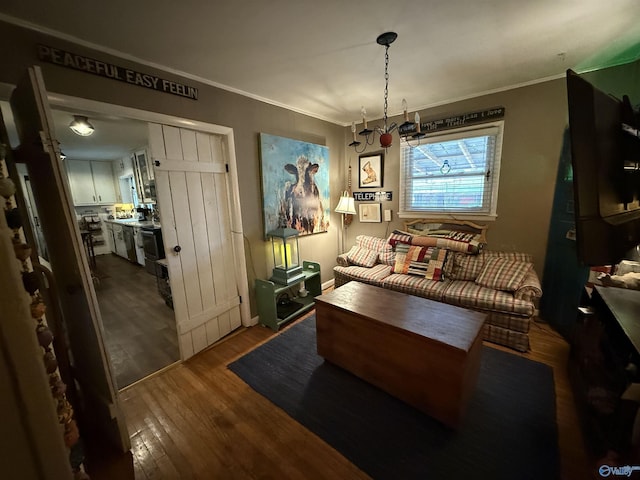 interior space with ornamental molding and wood finished floors