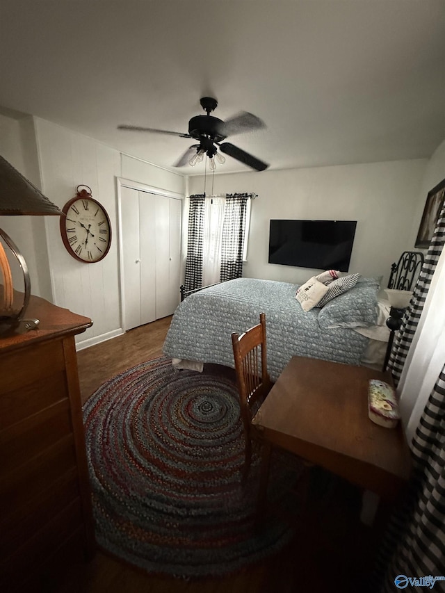 bedroom with ceiling fan and wood finished floors