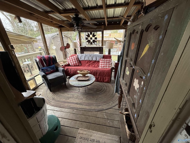 sunroom / solarium with ceiling fan