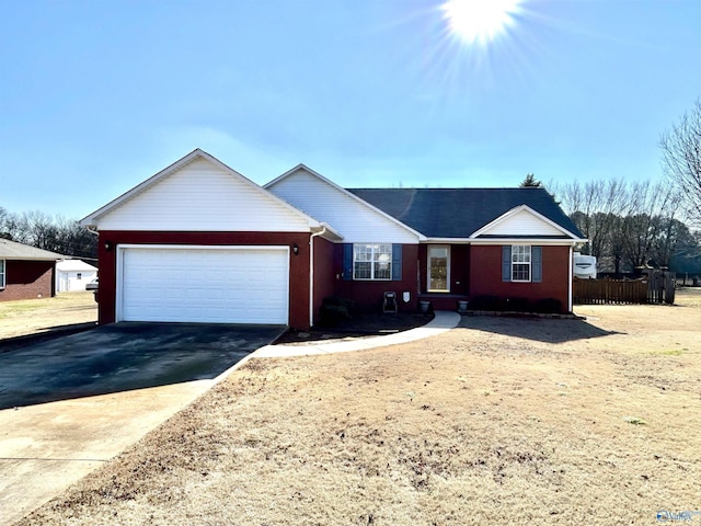 single story home with a garage