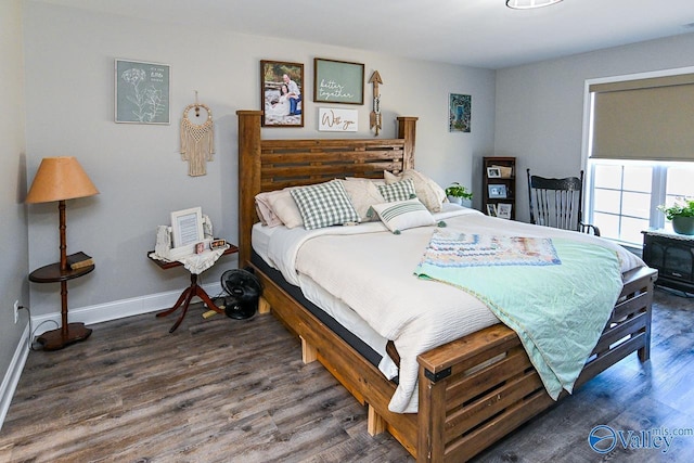 bedroom featuring dark wood-type flooring