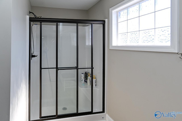 bathroom with an enclosed shower