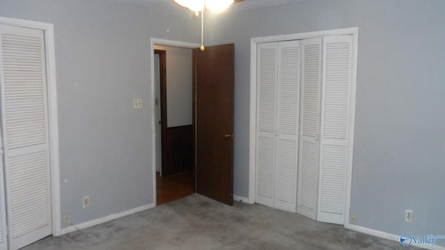 unfurnished bedroom with carpet floors