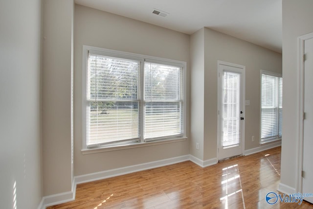 107 Palomino Ct, Madison, AL 35758 - foyer featuring healthy amount of natural light and wood finished floors