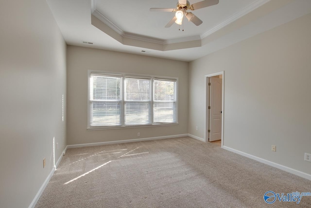 107 Palomino Ct, Madison, AL 35758 - spare room featuring ornamental molding, a ceiling fan, a raised ceiling, and carpet flooring