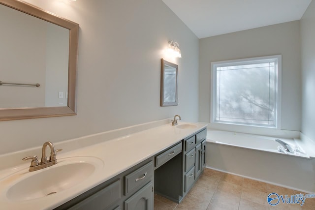 107 Palomino Ct, Madison, AL 35758 - full bath with double vanity, a garden tub, and tile patterned floors