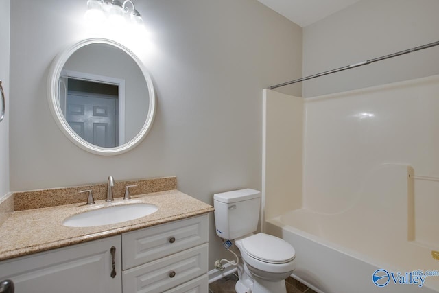 full bathroom with toilet, shower / bathing tub combination, and vanity