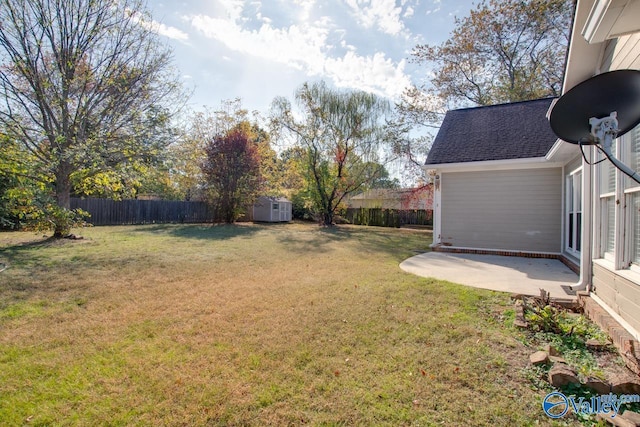 107 Palomino Ct, Madison, AL 35758 - fenced backyard featuring a patio area and a shed
