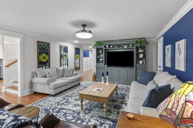 855 Haynes Rd NE, Arab, AL 35016 - living room featuring crown molding, wood finished floors, stairs, and baseboards