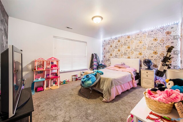 bedroom featuring carpet flooring