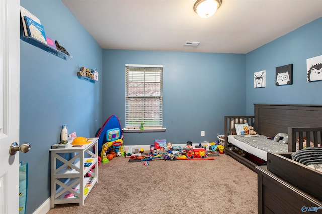 bedroom featuring carpet