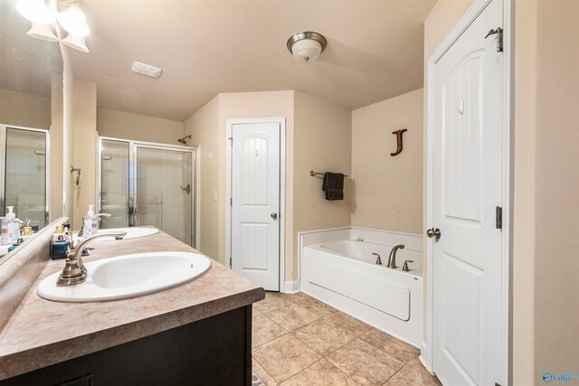 bathroom featuring vanity, plus walk in shower, and tile patterned flooring