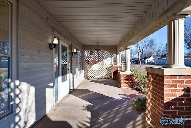 view of patio featuring a porch