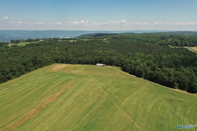 birds eye view of property with a forest view