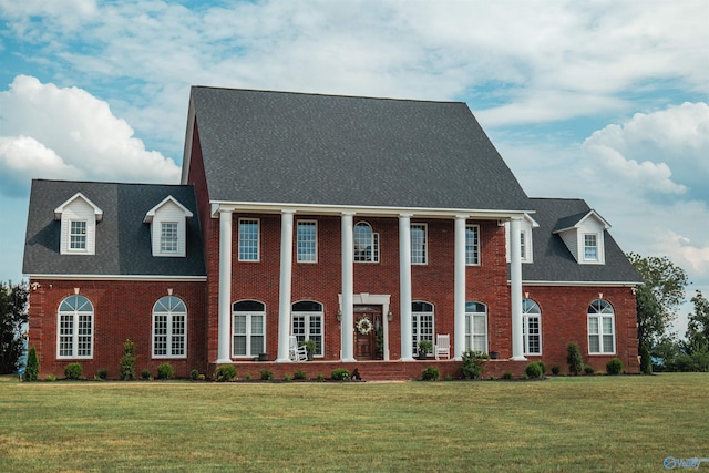 view of front of home with a front lawn