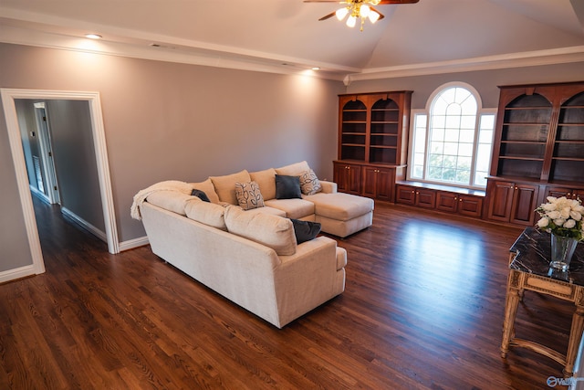 living room featuring vaulted ceiling, crown molding, ceiling fan, and hardwood / wood-style floors