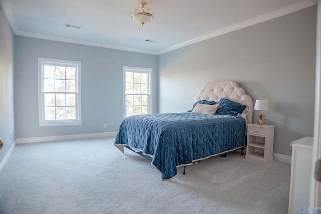 carpeted bedroom with crown molding