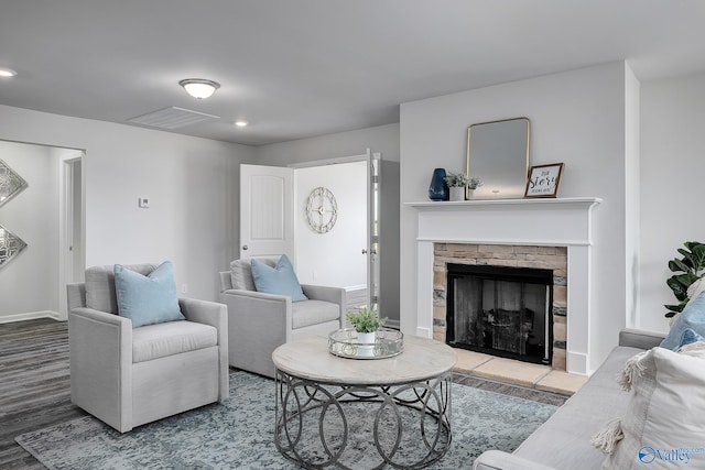 117 Huffman St, Hazel Green, AL 35750 - living room with baseboards, visible vents, wood finished floors, a fireplace, and recessed lighting