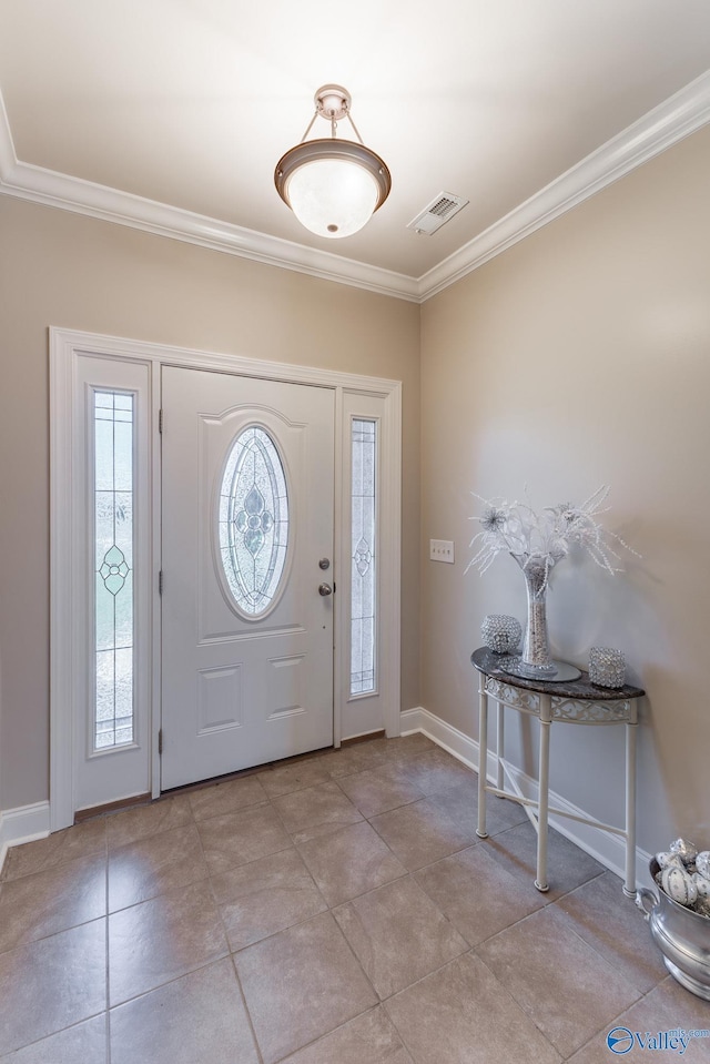 101 Tempo Cir, Harvest, AL 35749 - foyer with crown molding, baseboards, and light tile patterned flooring