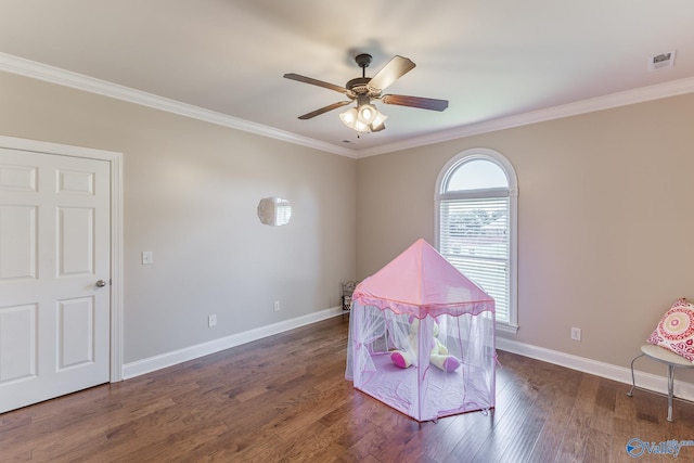 101 Tempo Cir, Harvest, AL 35749 - playroom featuring crown molding, a ceiling fan, baseboards, and wood finished floors