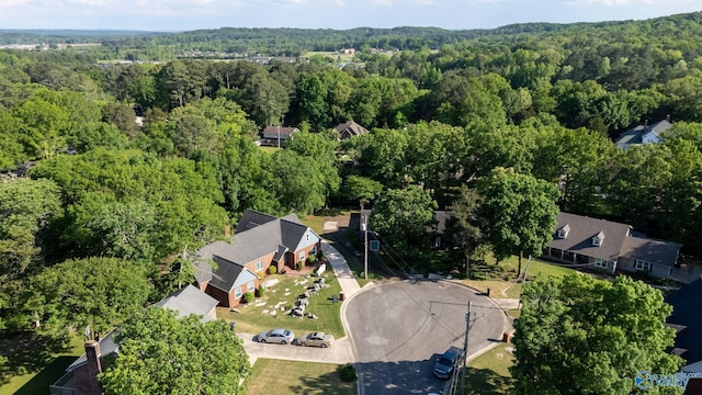 aerial view featuring a view of trees