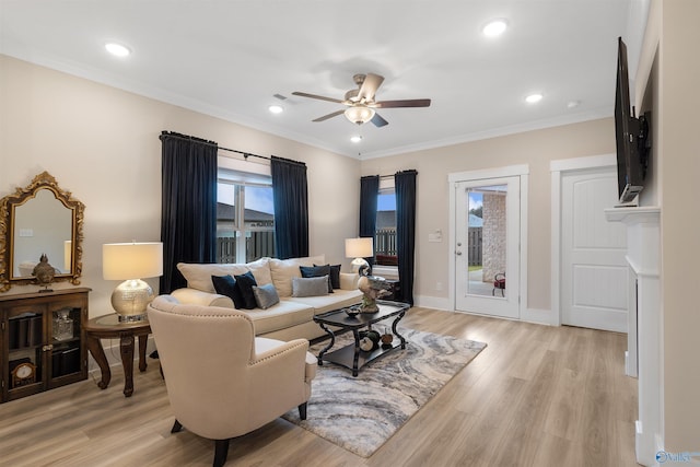 413 Lando Cain Rd, Hartselle, AL 35640 - living area with ceiling fan, light wood finished floors, ornamental molding, recessed lighting, and baseboards