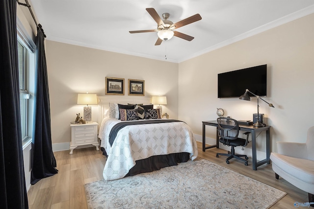 413 Lando Cain Rd, Hartselle, AL 35640 - bedroom with ornamental molding, wood finished floors, baseboards, a desk, and a ceiling fan