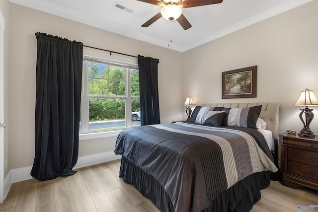 413 Lando Cain Rd, Hartselle, AL 35640 - bedroom featuring light wood-type flooring, baseboards, and a ceiling fan