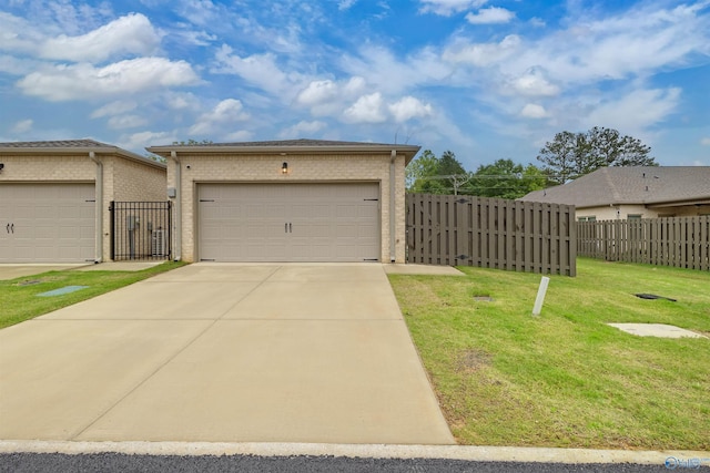 413 Lando Cain Rd, Hartselle, AL 35640 - view of front facade with brick siding, a garage, and an outdoor structure
