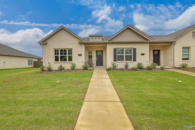 413 Lando Cain Rd, Hartselle, AL 35640 - view of front facade featuring brick siding and a front yard